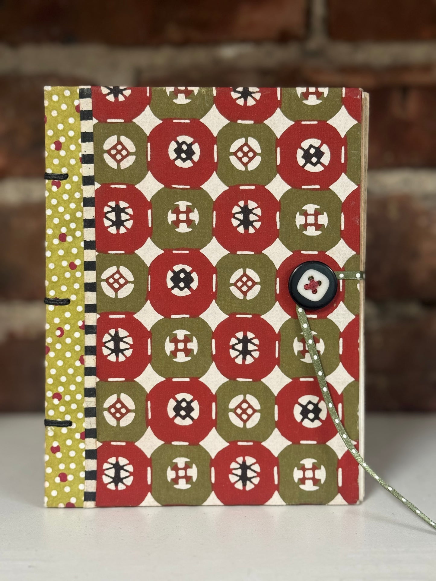 Exposed-Spine Journal — Button Closure (Red & Olive Pattern)