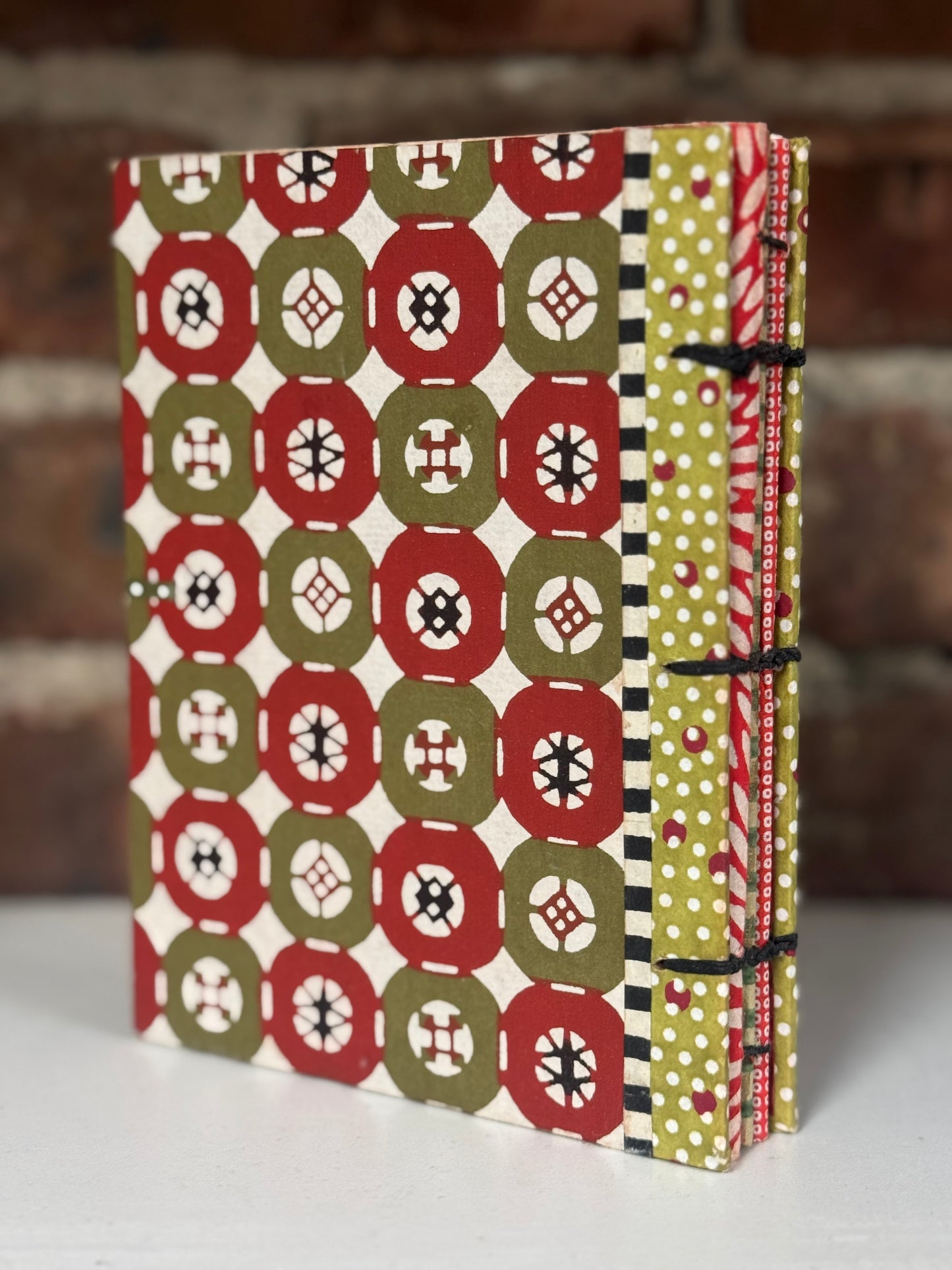 Exposed-Spine Journal — Button Closure (Red & Olive Pattern)